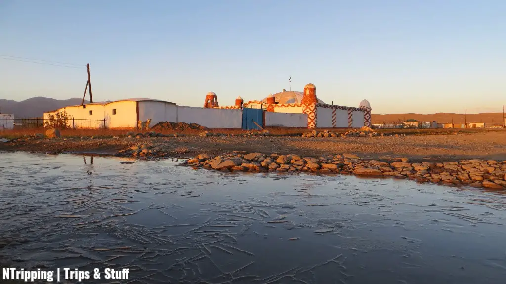Mosque And Frozen Water In Alichur