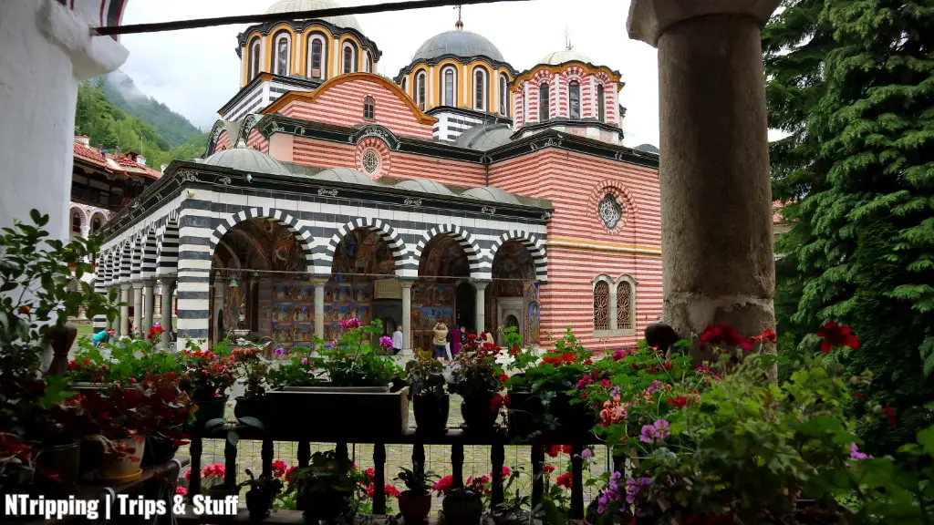 Flowers Under The Arcades Of The Rila Monastery